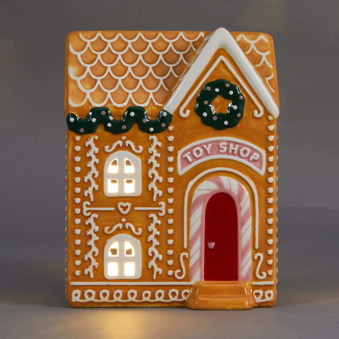1 Light Up Ceramic Gingerbread Toy Shop, 1 of 6