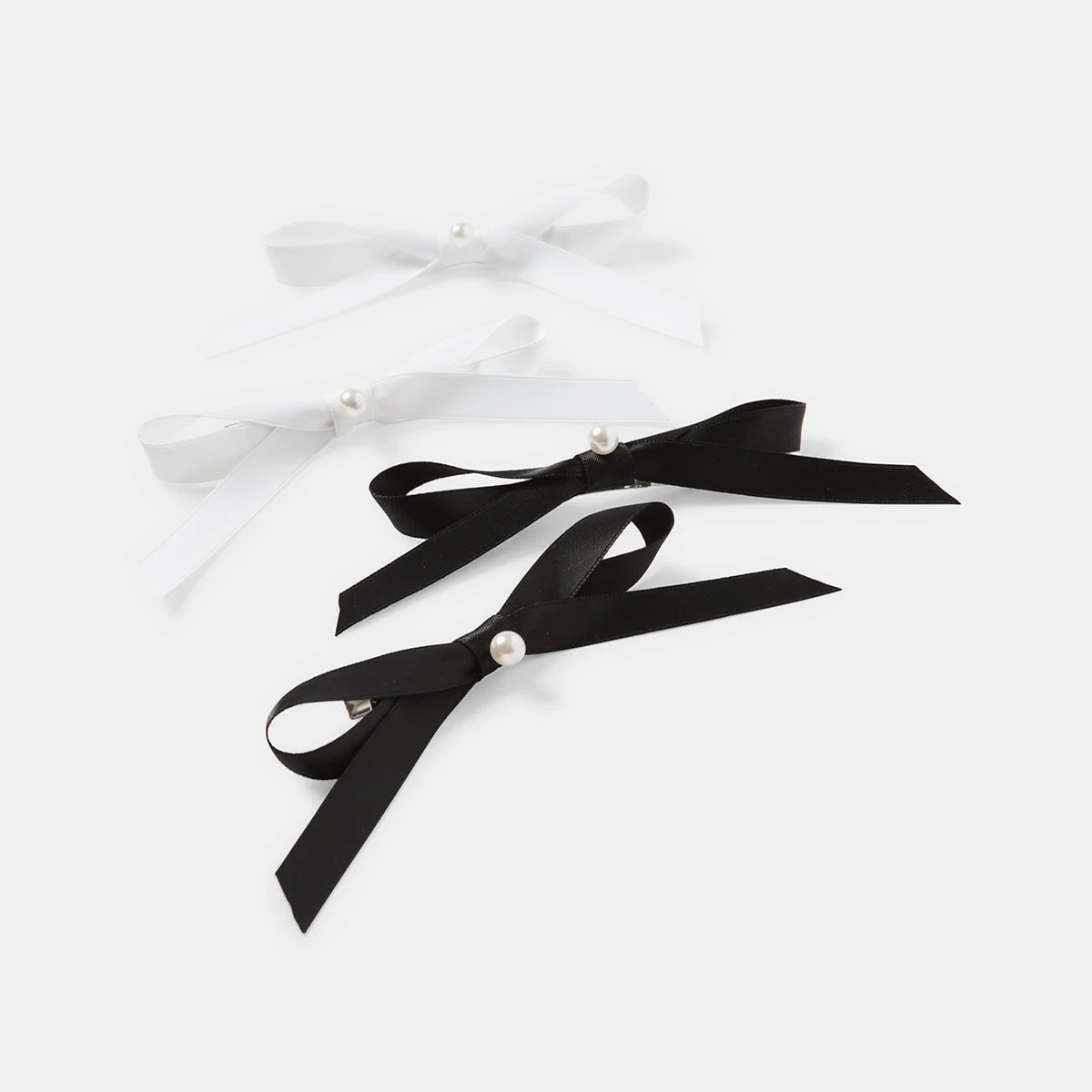 1 4 Pack White and Black Bow Pearl Hair Clips, 1 of 4