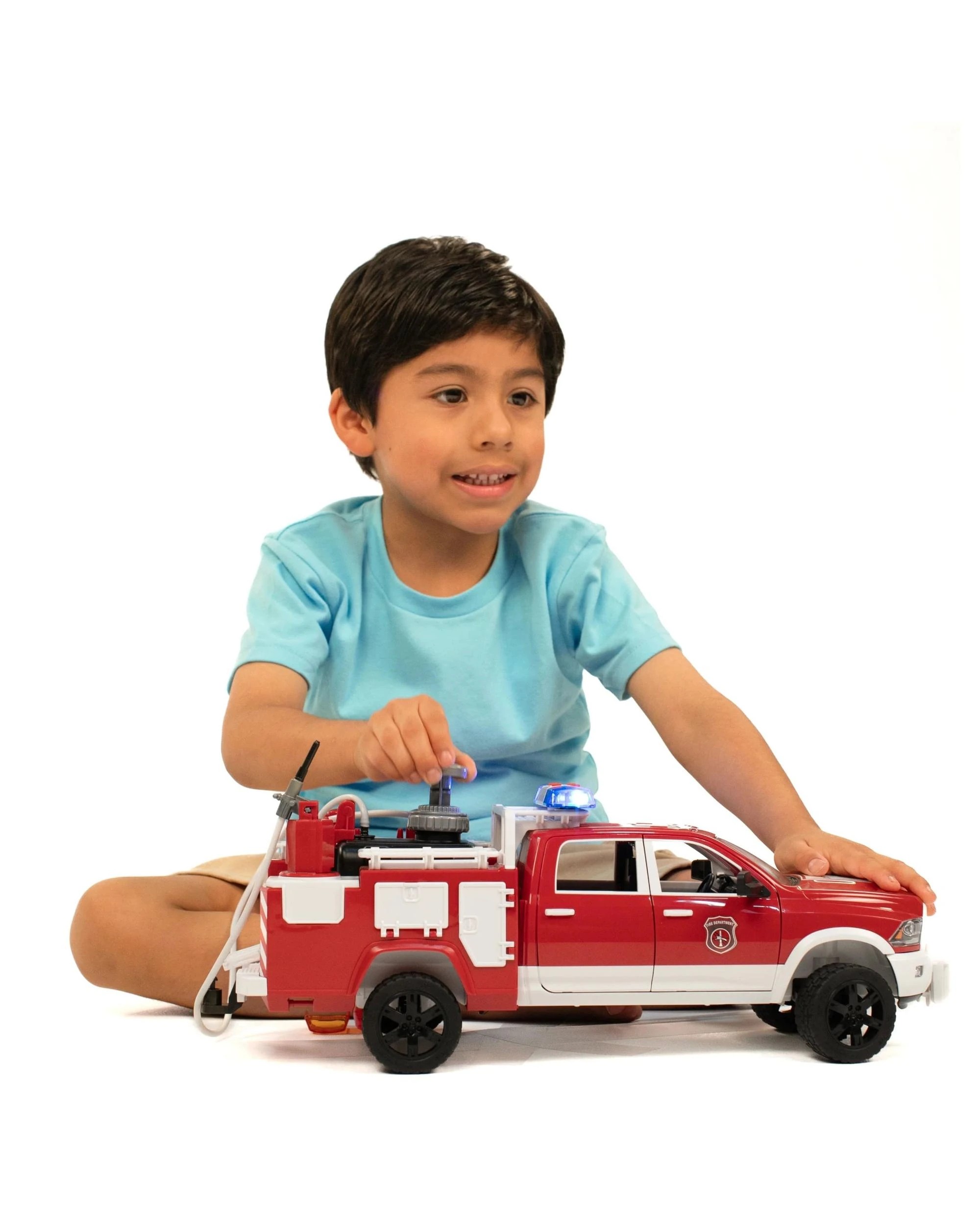 9 Bruder Emergency RAM 2500 Fire Engine Truck with Light and Sound Module - Red, 9 of 9