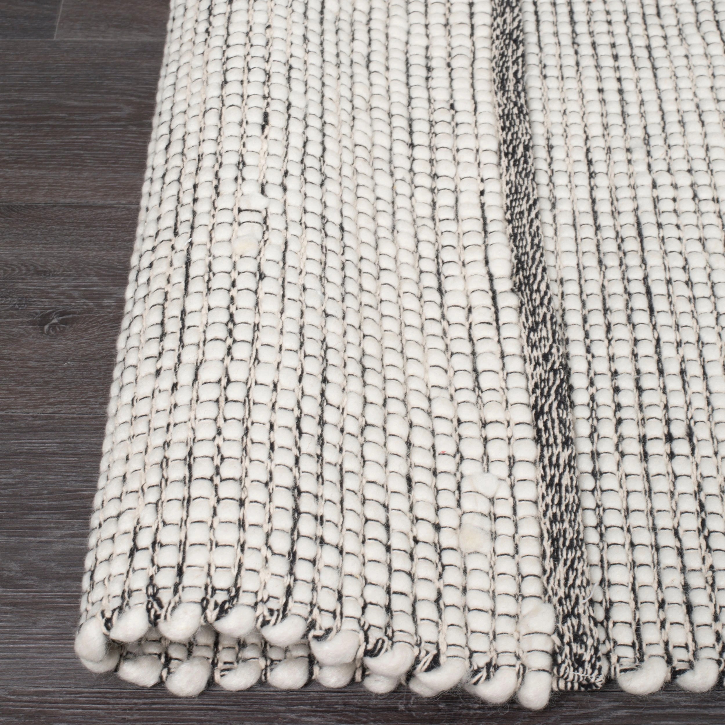 7 Common Ground Rugs Atelier 73 225x155cm - Black, 7 of 7