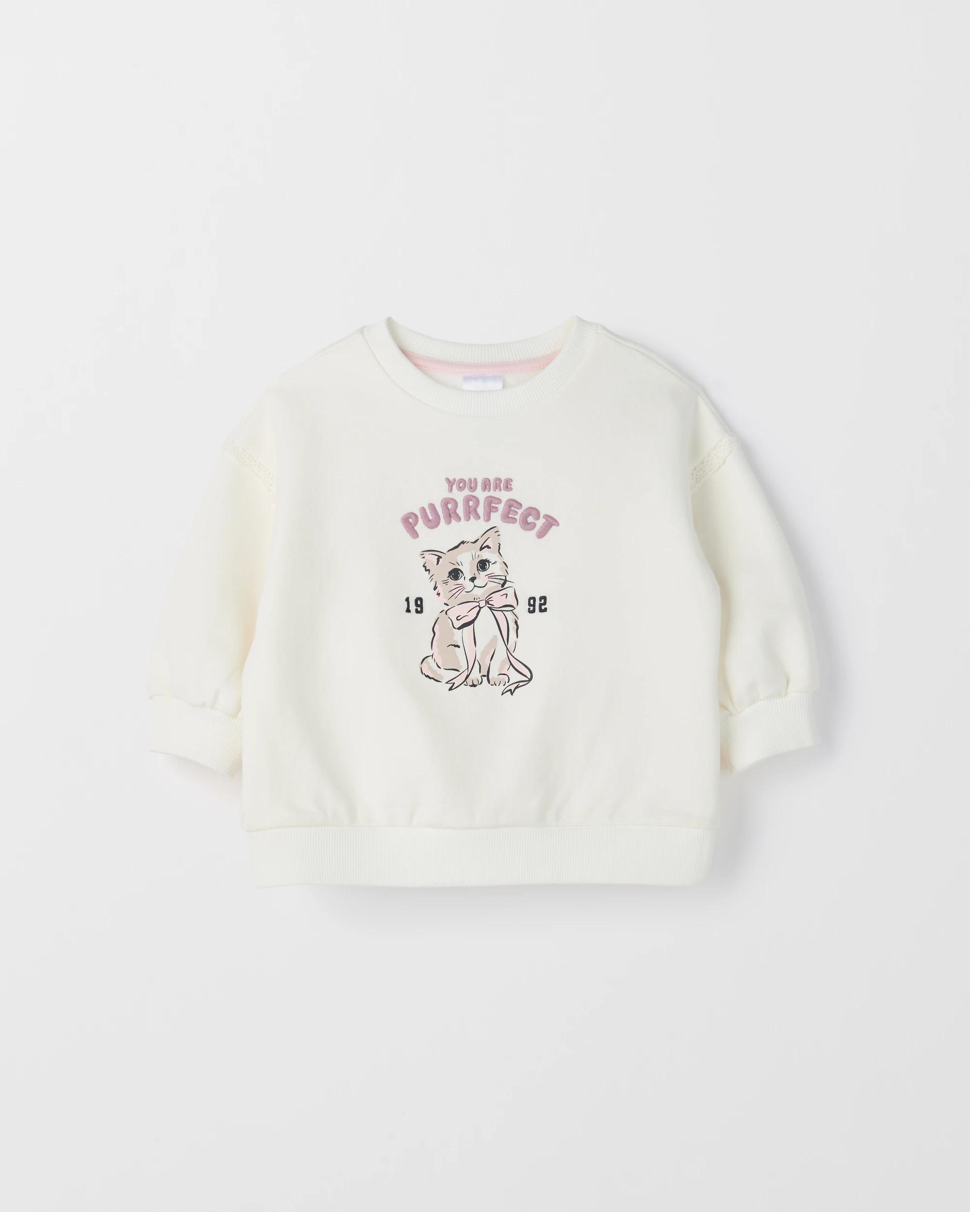1 Target Baby Baby Organic Cotton Lace Frill Jumper PURRFECT GARDENIA, 1 of 1