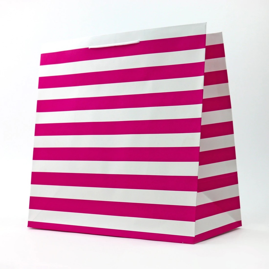 1 Connections from Hallmark Extra-Large Gift Bag - Pink and White Stripes, 1 of 3