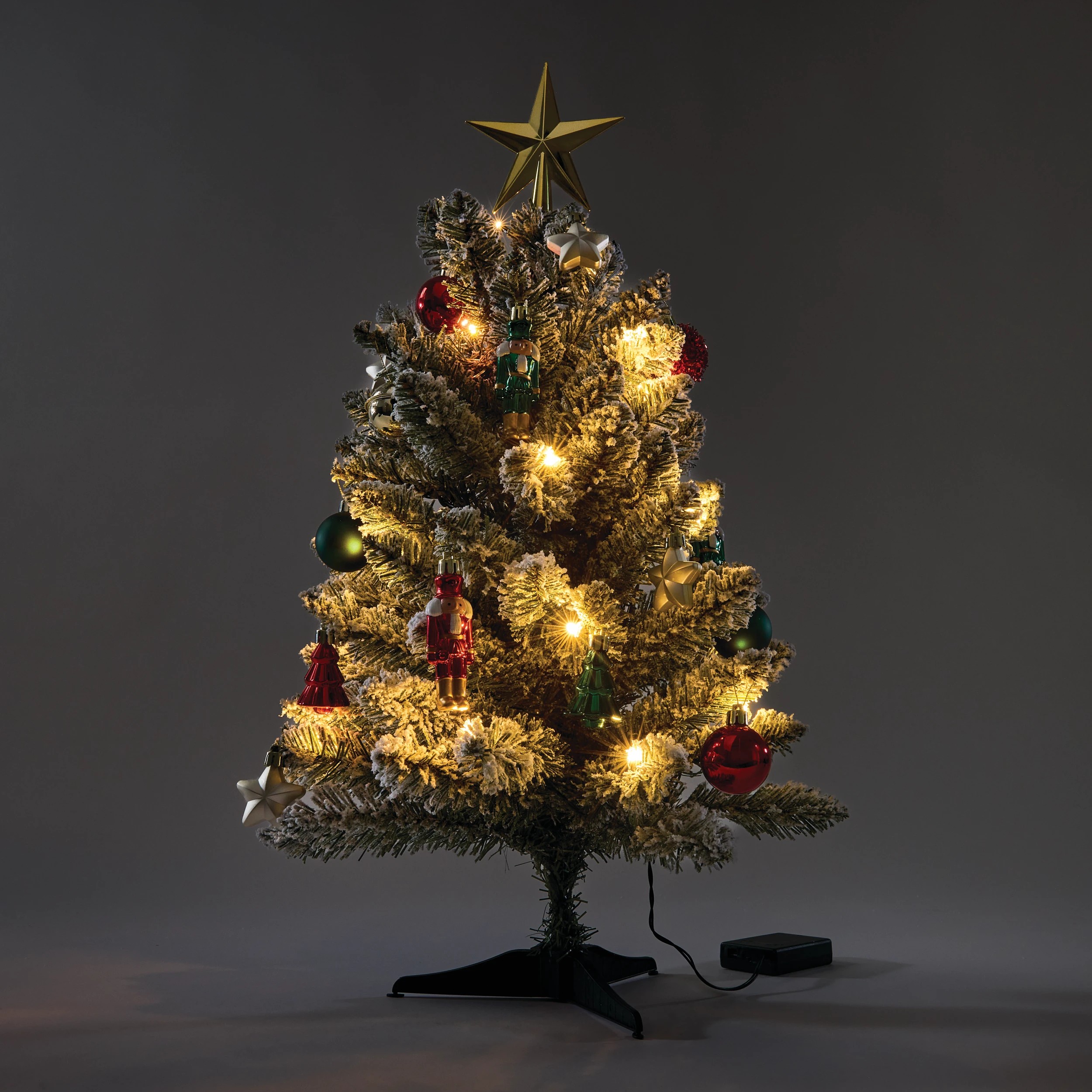 1 60cm (2ft.) Light Up Mini Green Flocked Christmas Tree, 1 of 10