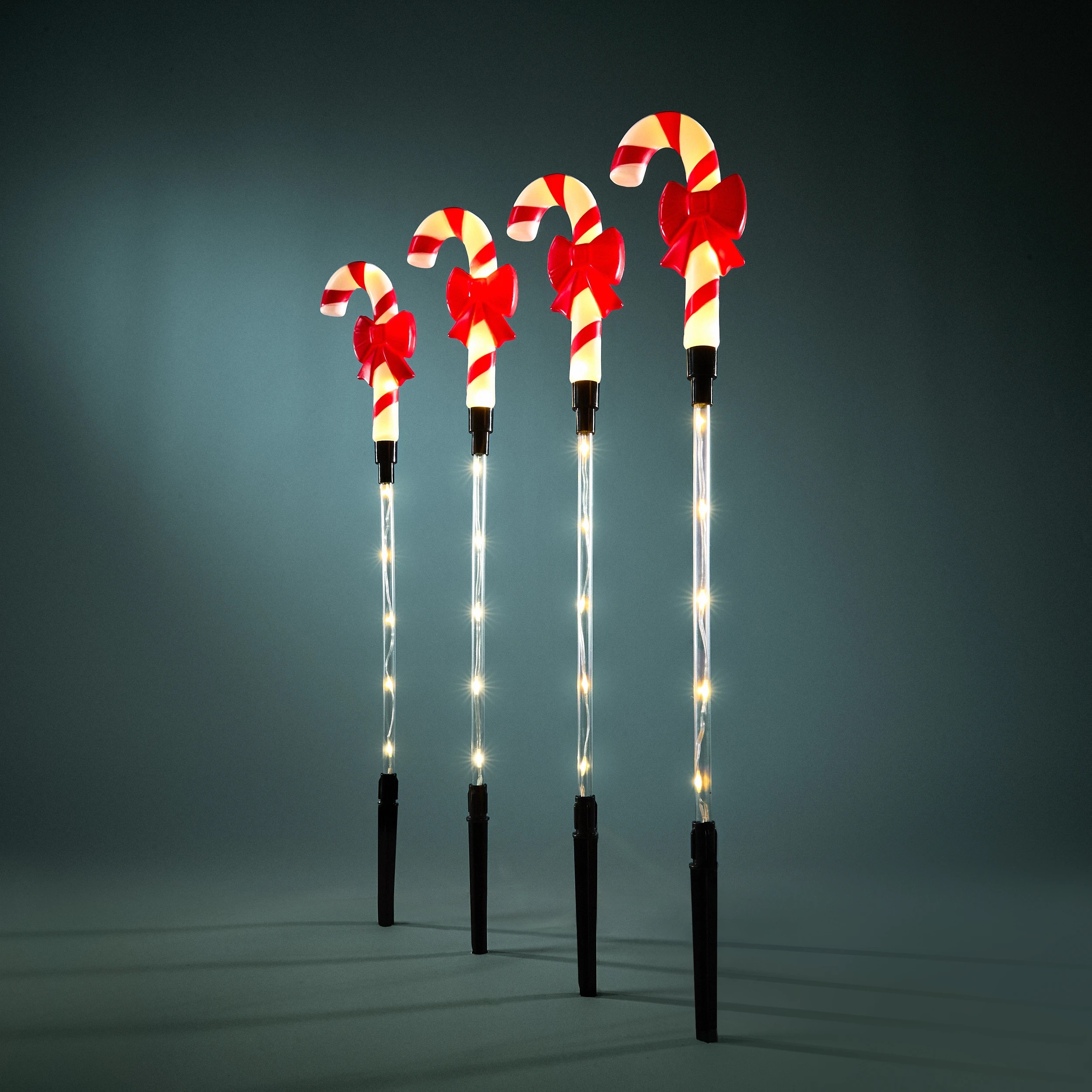 1 4 Pack Solar LED Light-Up Multifunction Candy Cane Stakes, 1 of 8