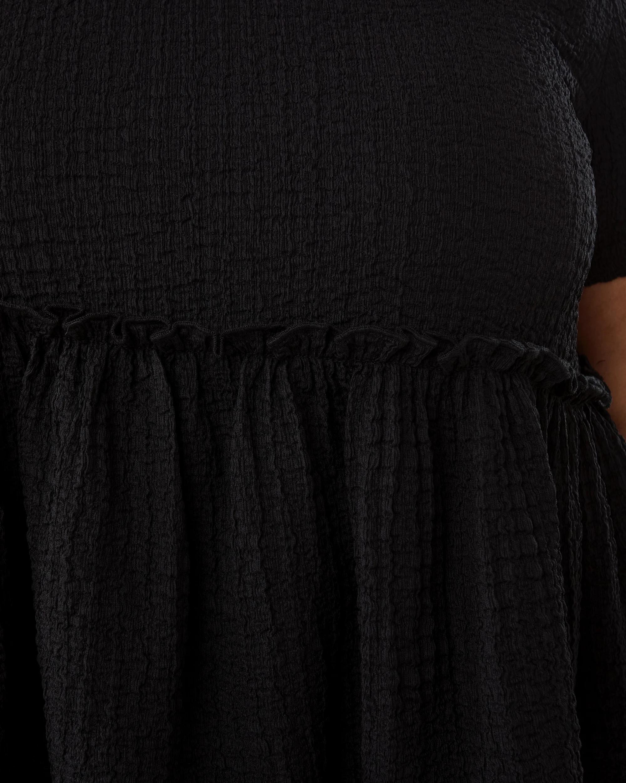 6 Curve Short Sleeve Textured Peplum Top Black, 6 of 7