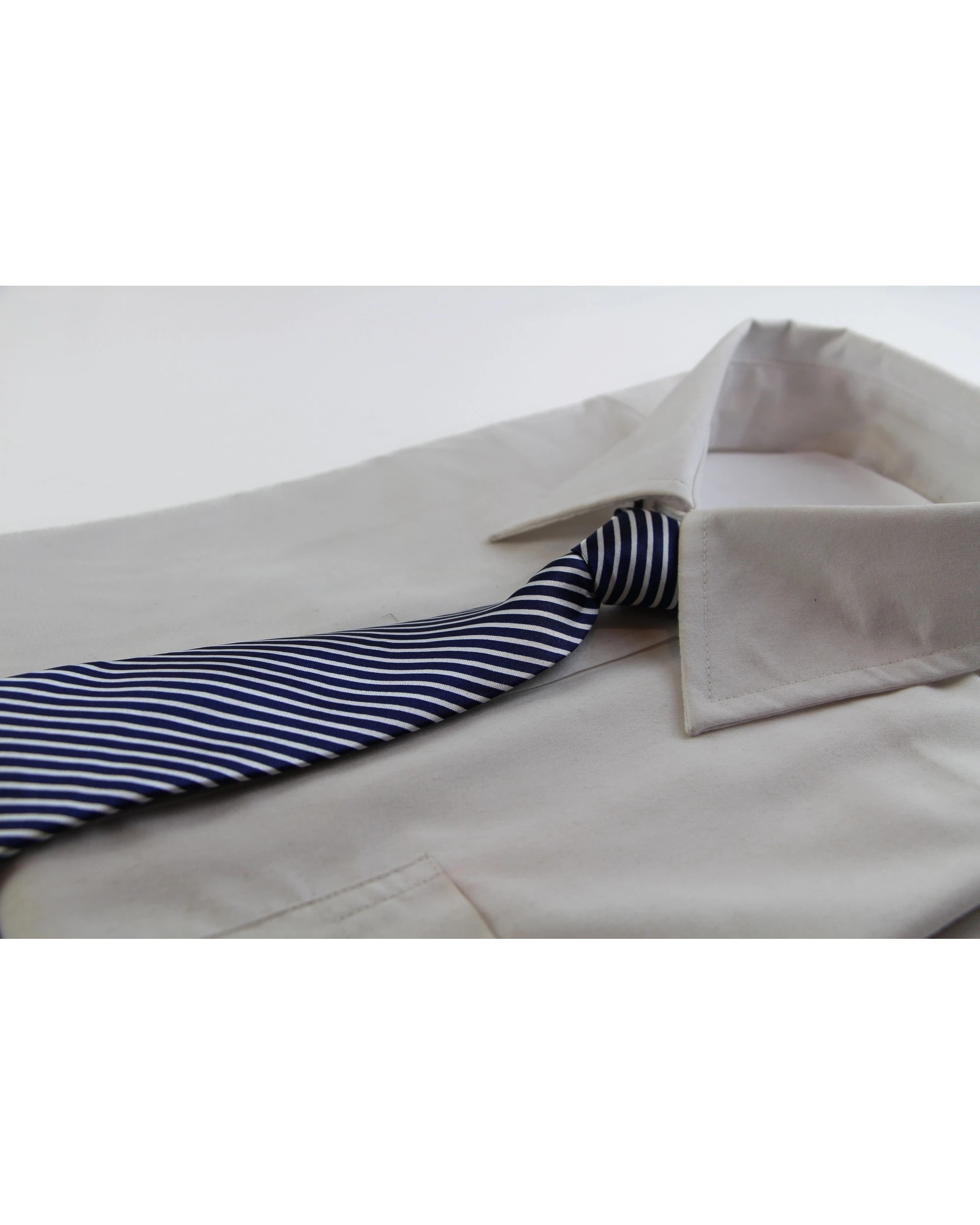 1 Zasel Kids Boys Navy & White Diagonal Patterned Elastic Neck Tie, 1 of 2