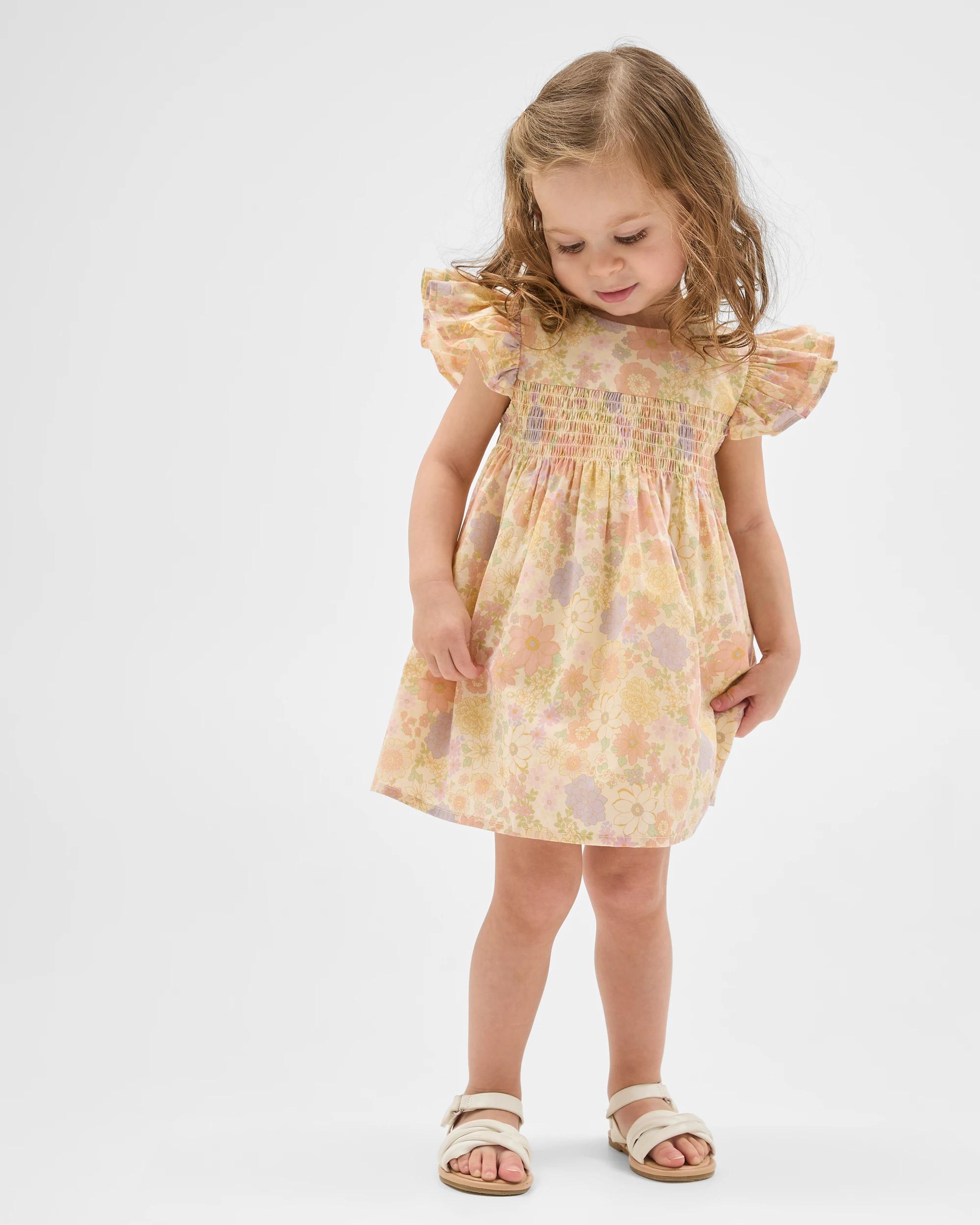 1 Target Baby Cotton Short Sleeve Shirred Woven Dress FLORAL LEMON ICING, 1 of 5