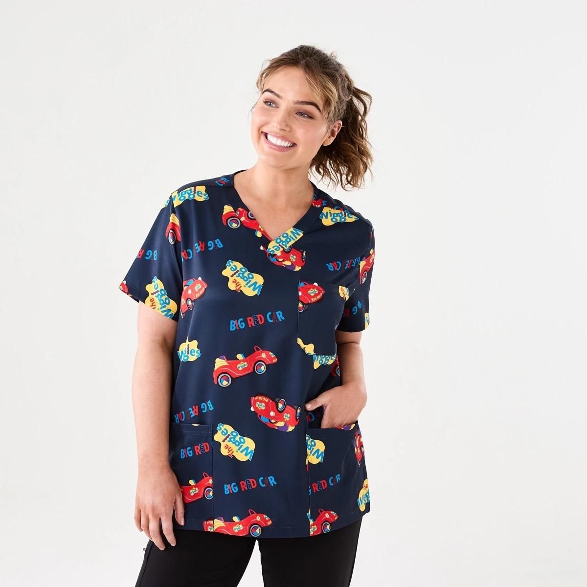 1 Work Short Sleeve Wiggles License Scrub Top Wiggles, 1 of 6