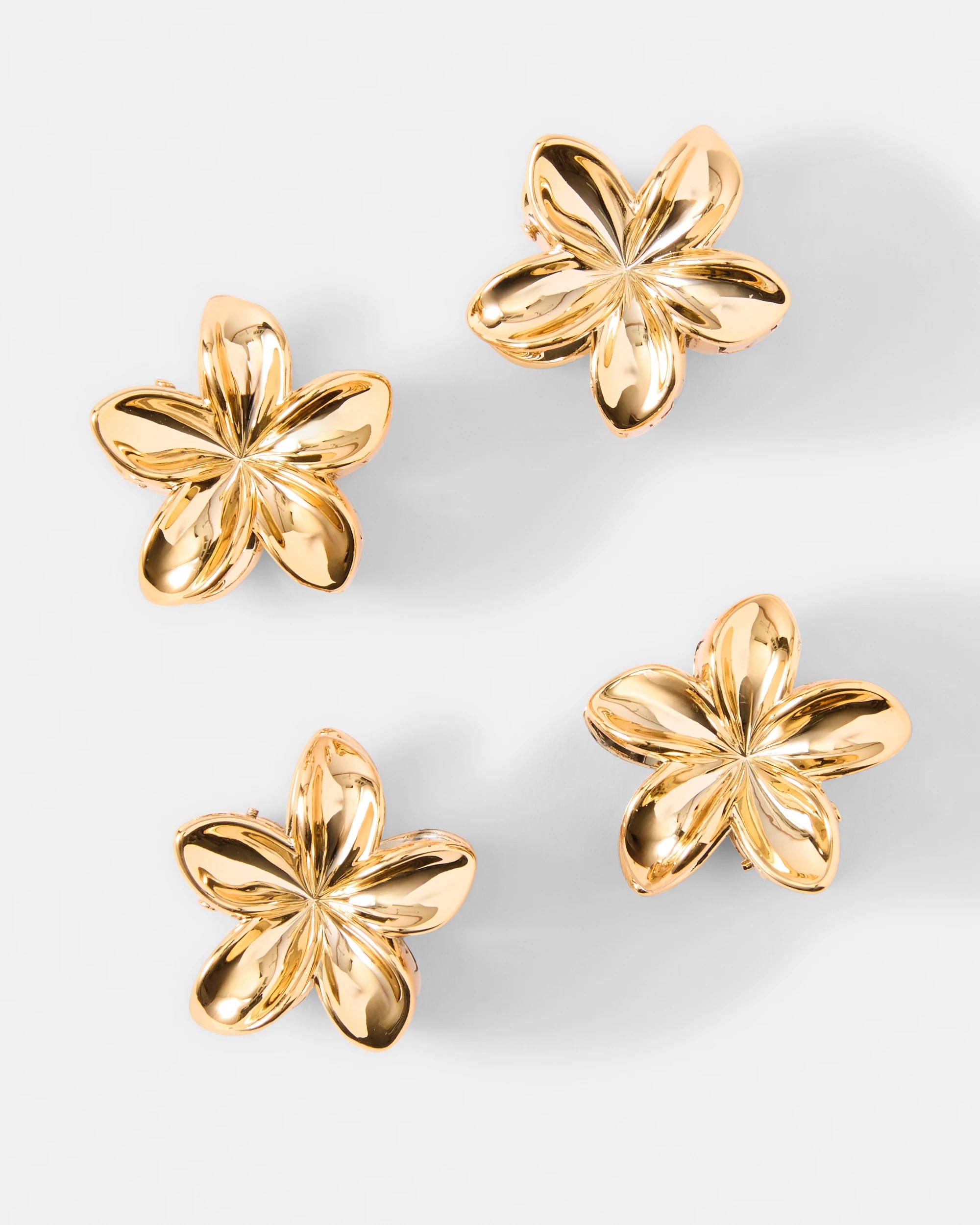 1 4 Pack Mini Frangipani Claw Hair Clips, 1 of 4