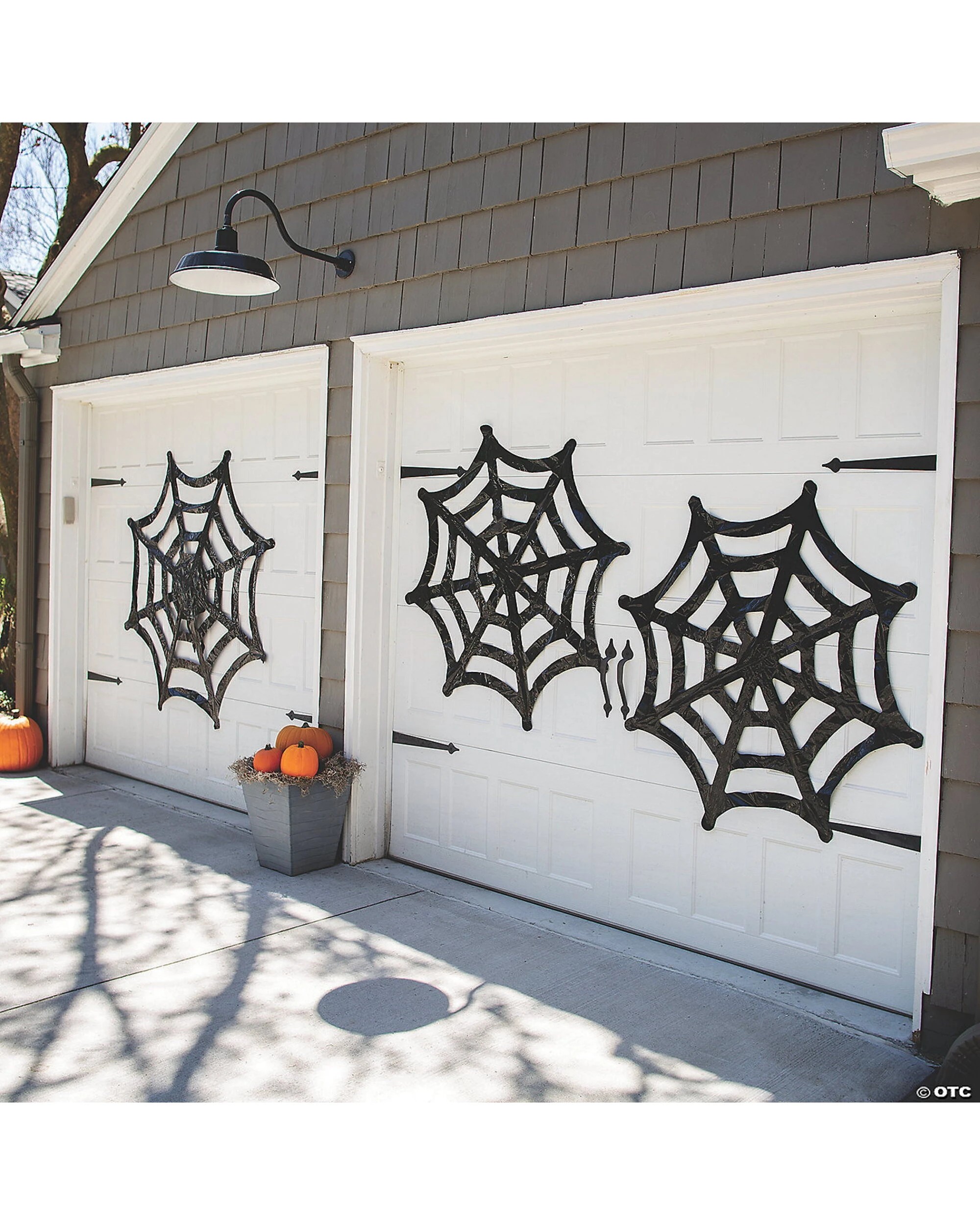 1 Fun Express Giant Plastic Spider Web Wall Decorations Pack of 3 - Black, 1 of 2
