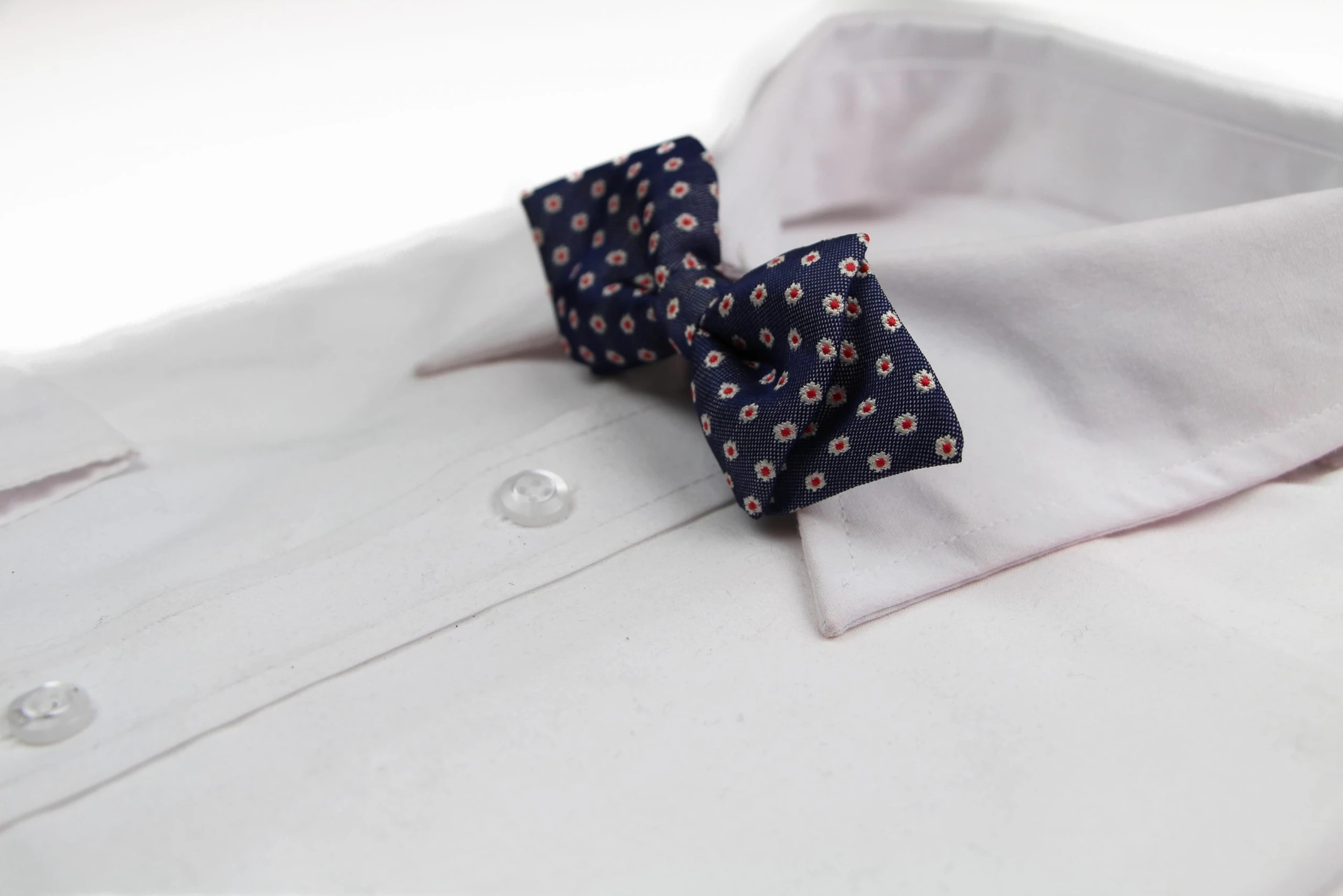 1 Zasel Boys Diamond Navy With White & Red Flowers Patterned Cotton Bow Tie, 1 of 2