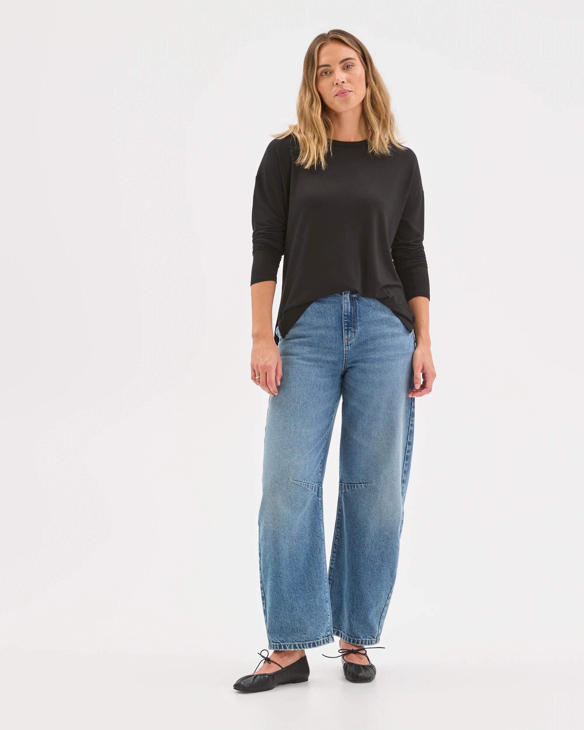 1 Target Woman Long Sleeve Drop Shoulder Curved Hem Top BLACK, 1 of 6