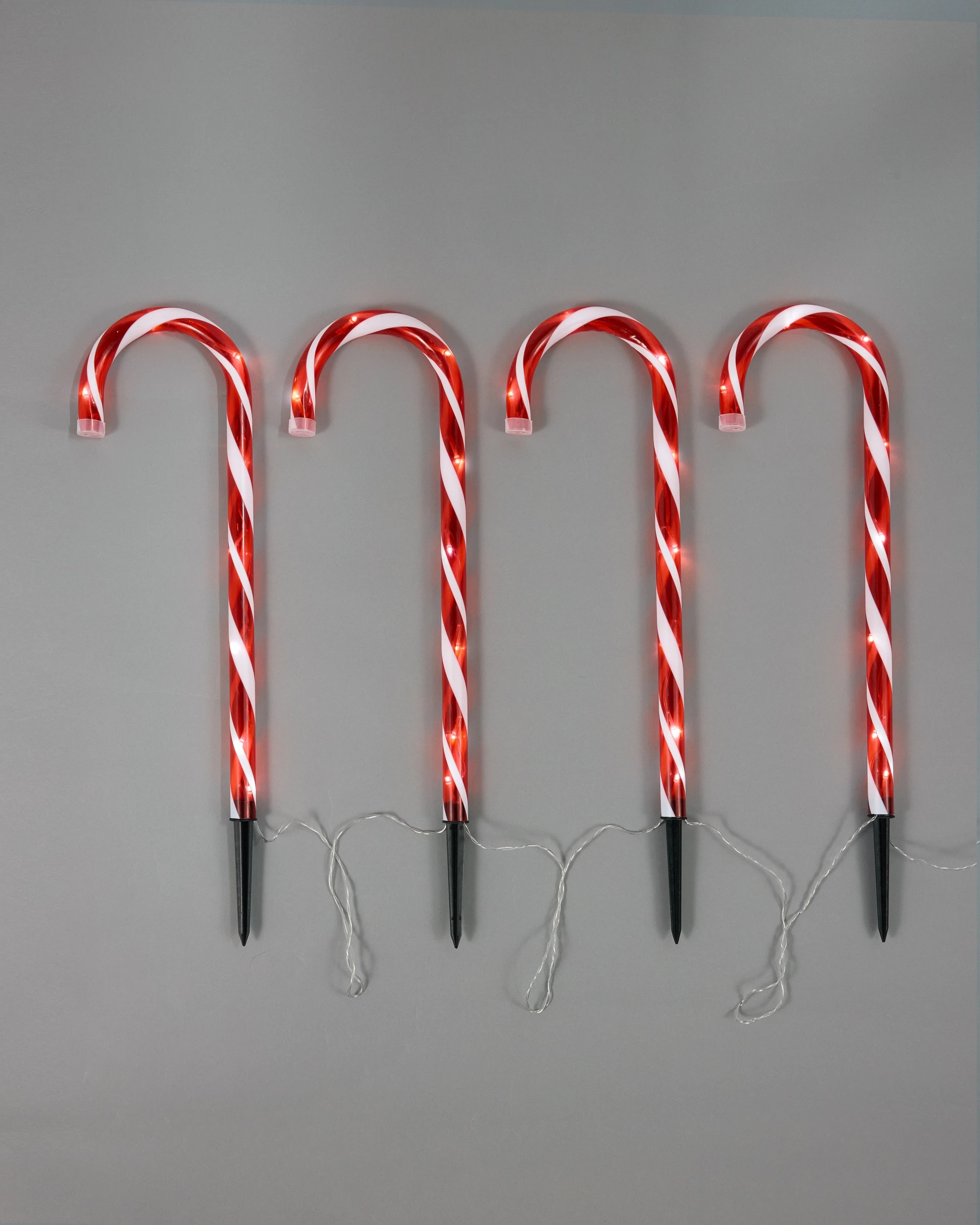 1 4 Pack Solar Powered LED Light Up Candy Cane Stakes, 1 of 9
