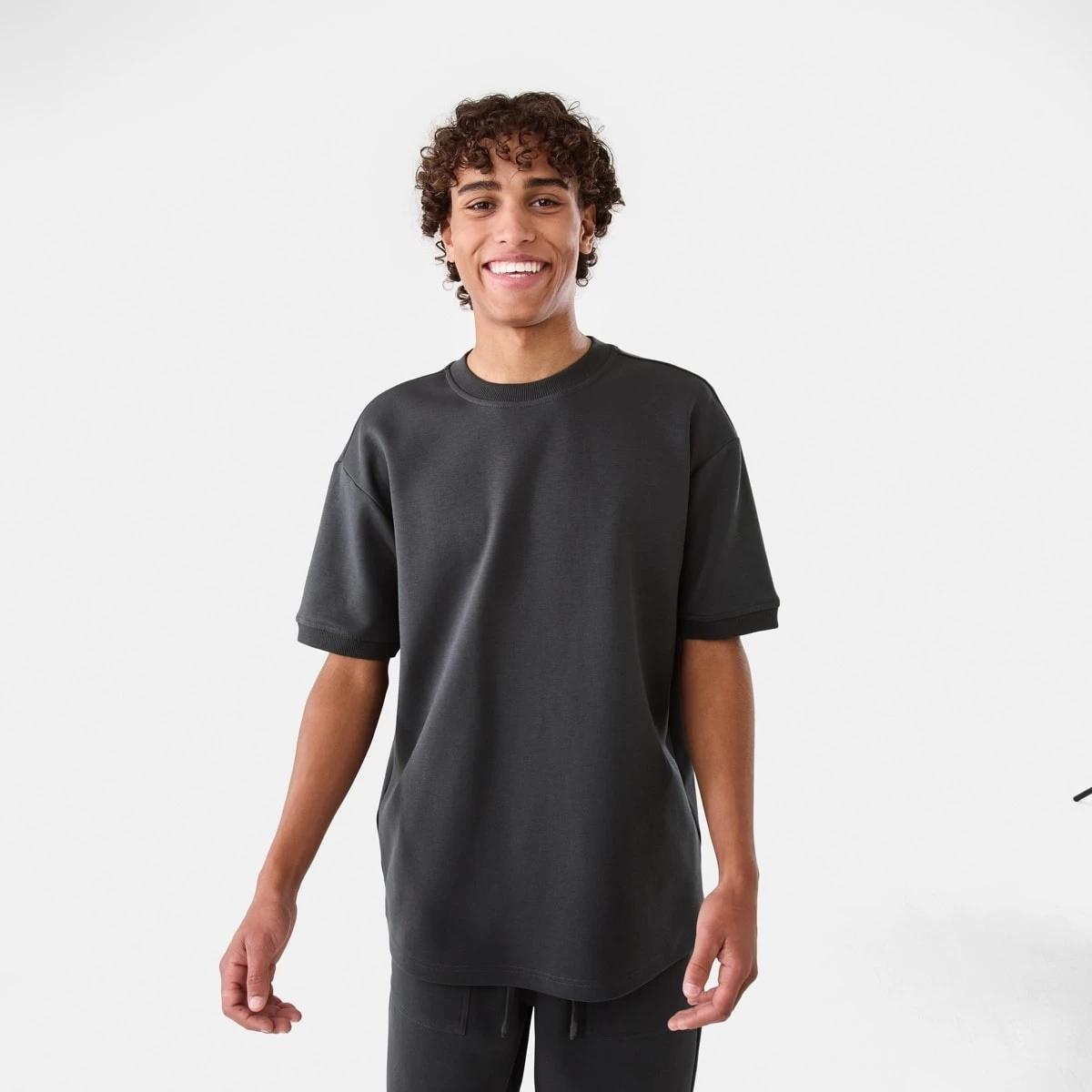 1 Oversized Interlock T-shirt VOLCANIC ROCK, 1 of 6